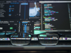 Glasses in front of computer